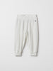 White Velour Baby Trousers from the Polarn O. Pyret baby collection. Nordic baby clothes made from sustainable sources.