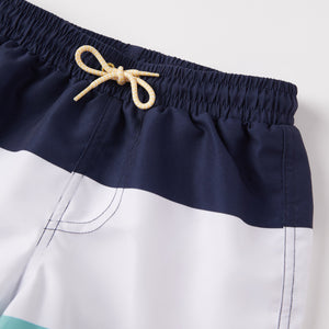 Block Stripe Kids Swim Shorts from the Polarn O. Pyret baby collection. Nordic kids clothes made from sustainable sources.
