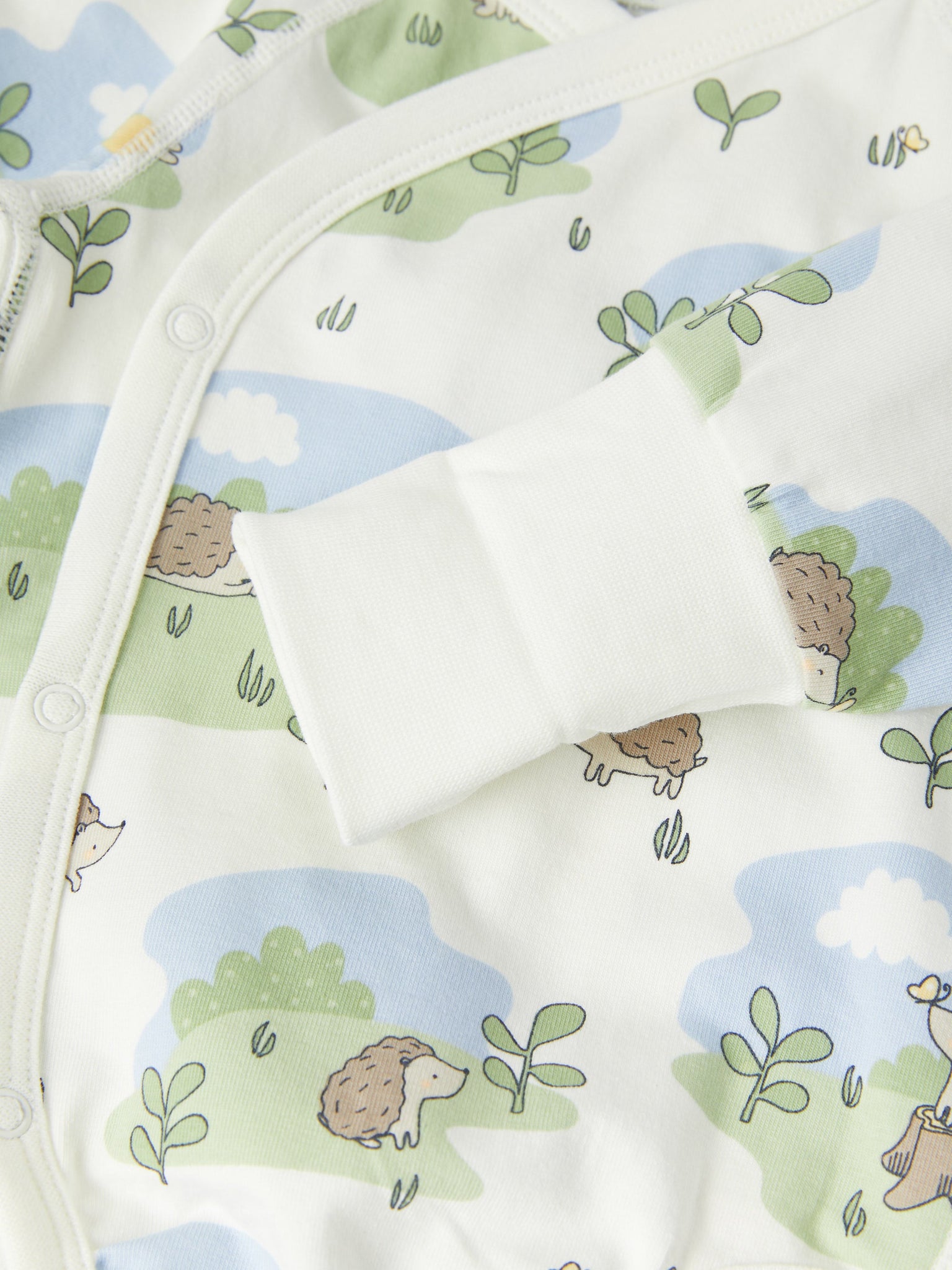 Squirrel Print Wraparound Babygrow from the Polarn O. Pyret baby collection. Clothes made using sustainably sourced materials.