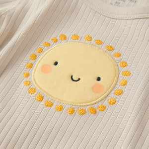 Organic Cotton Sun Appliqué Babygrow from the Polarn O. Pyret baby collection. Ethically produced kids clothing.