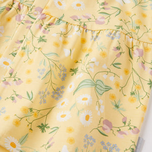 Ditsy Floral Baby Dress from the Polarn O. Pyret baby collection. Clothes made using sustainably sourced materials.