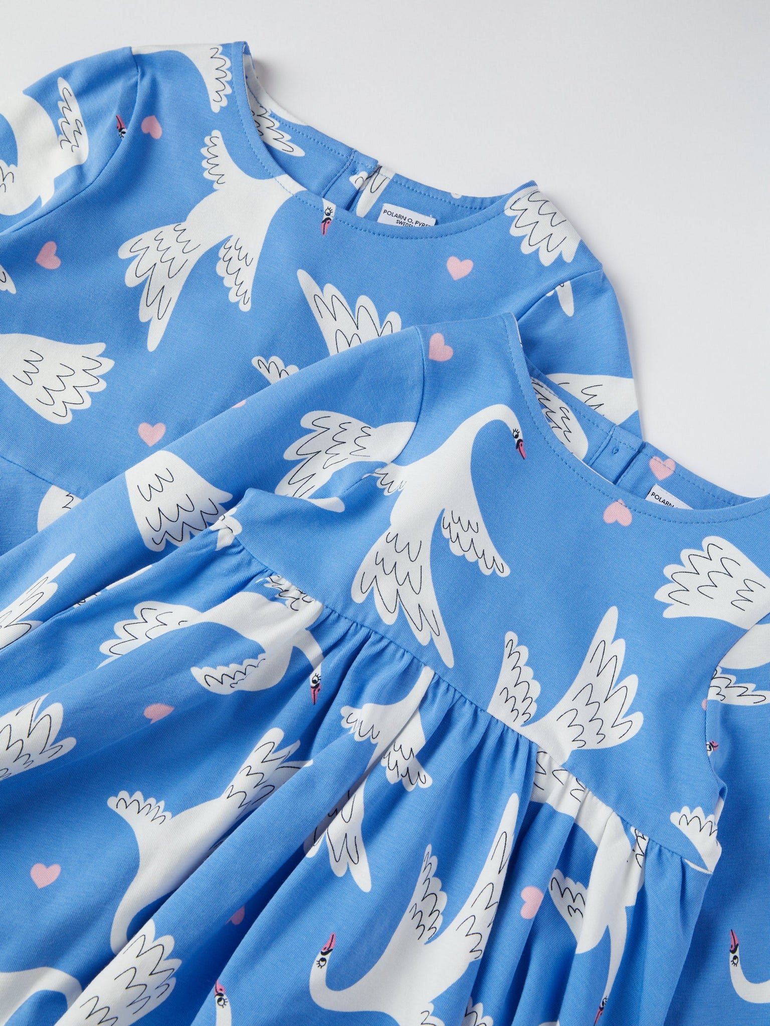 Organic Cotton Swan Print Kids Dress from the Polarn O. Pyret kidswear collection. The best ethical kids clothes