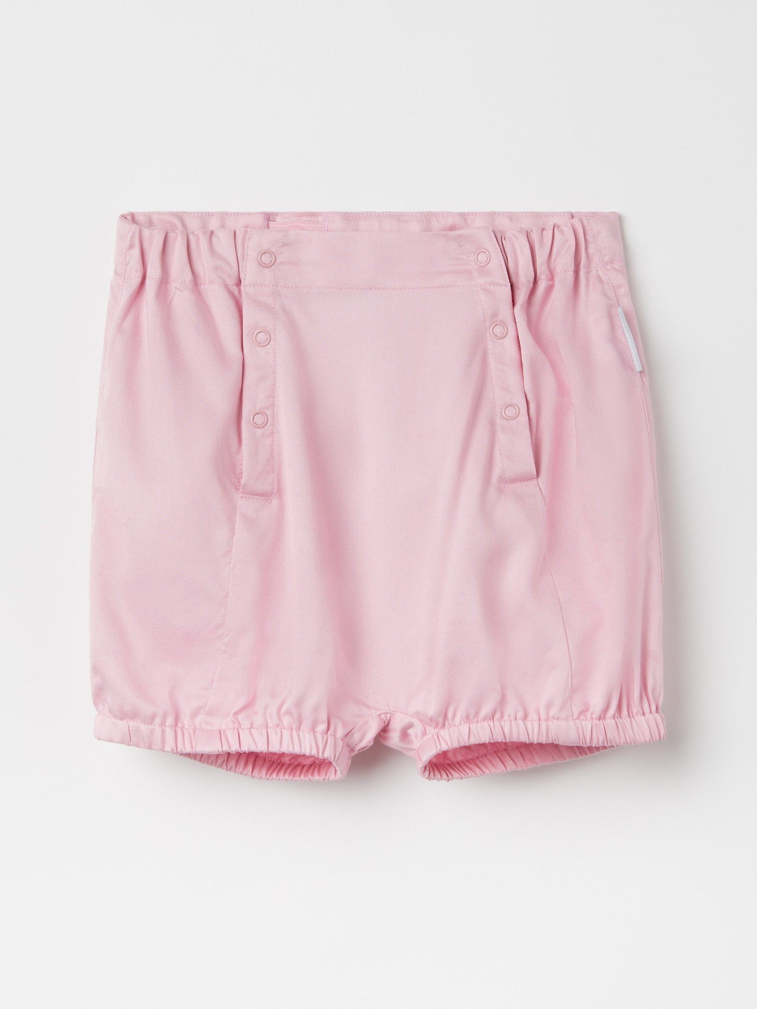 Pretty Pink Cotton Baby Shorts from the Polarn O. Pyret baby collection. Clothes made using sustainably sourced materials.