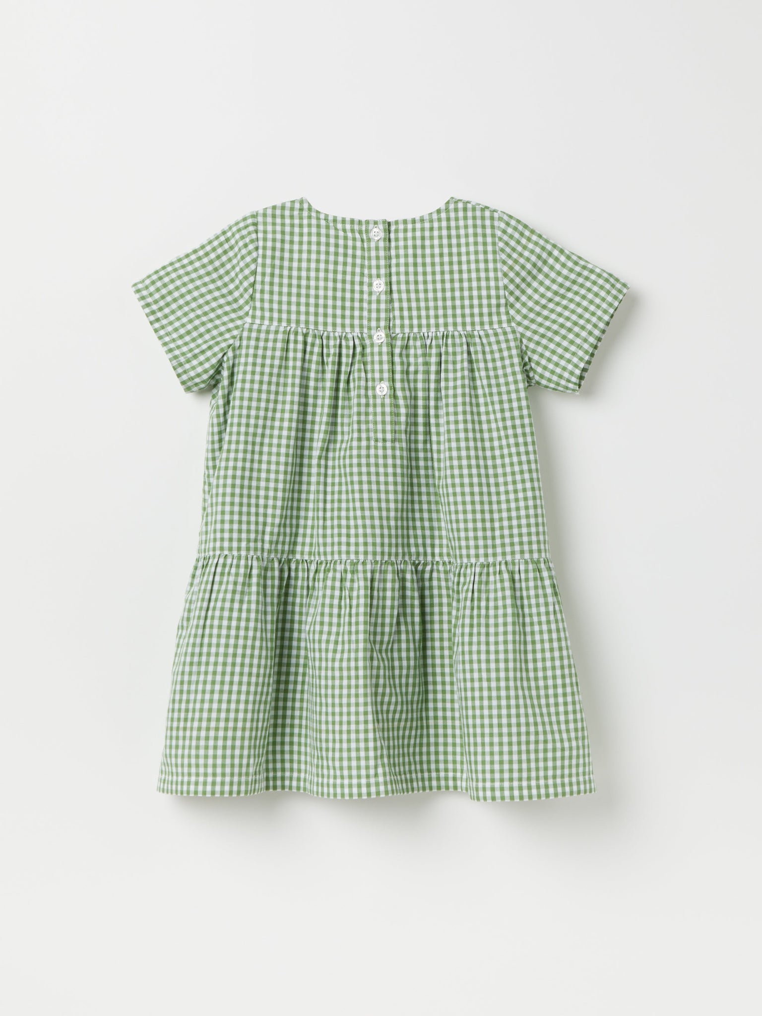 Green Gingham Check Kids Dress from the Polarn O. Pyret kidswear collection. Nordic kids clothes made from sustainable sources.