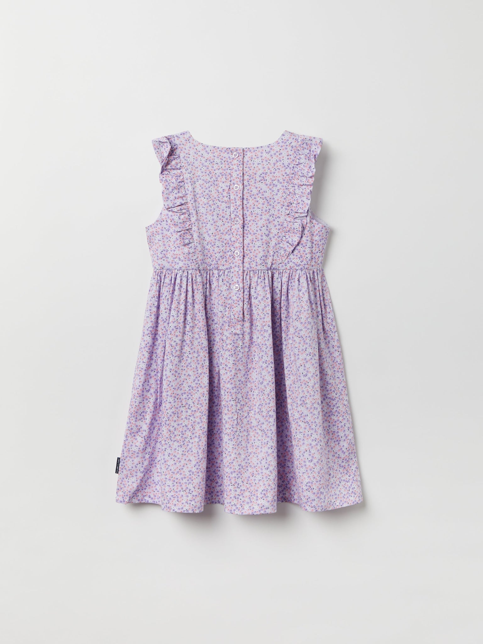 Ditsy Floral Ruffled Dress from the Polarn O. Pyret kidswear collection. Nordic kids clothes made from sustainable sources.