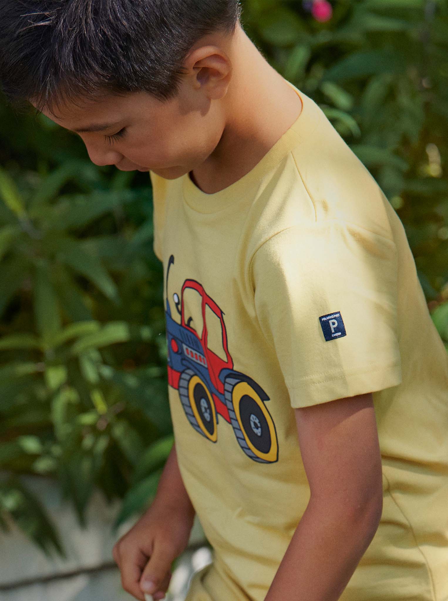 Tractor Print Yellow Kids T-Shirt from Polarn O. Pyret Kidswear. Made from 100% GOTS Organic Cotton.