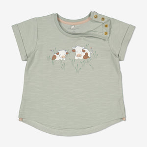 Cow Print Green Baby T-Shirt from Polarn O. Pyret Kidswear. Made using sustainable sourced materials.