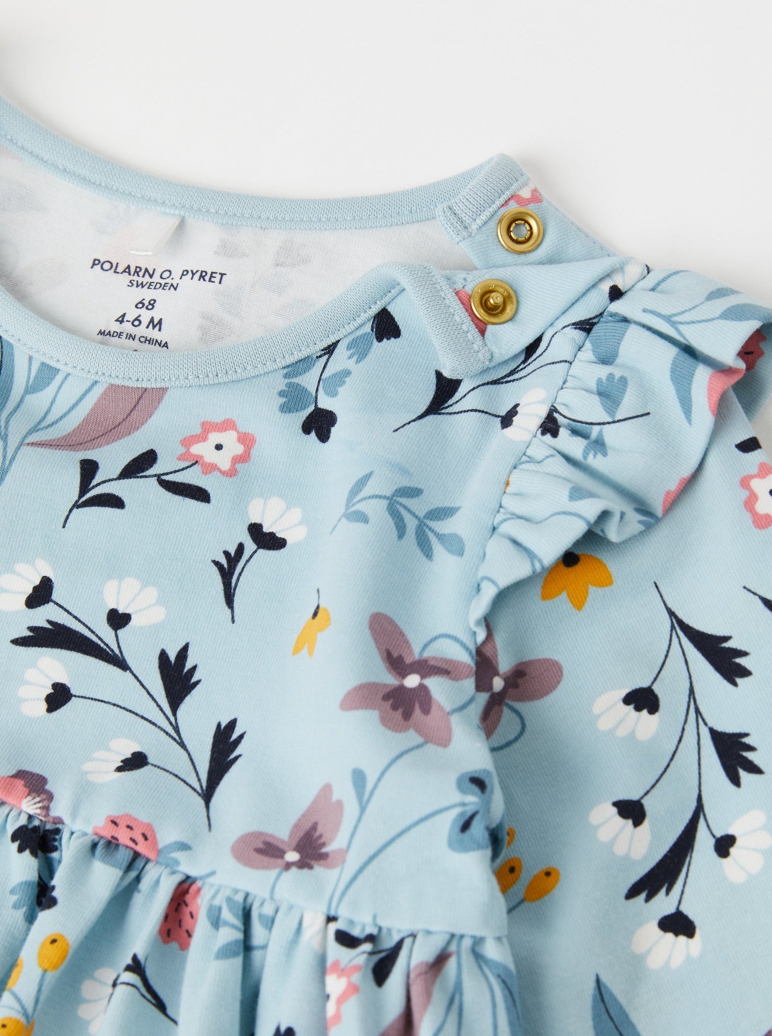 Blue Floral Print Baby Dress from the Polarn O. Pyret babywear collection. Ethically produced kids clothing.