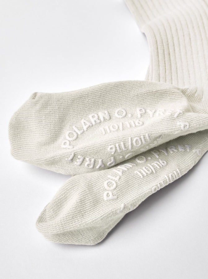 Organic Cotton White Baby Tights from the Polarn O. Pyret babywear collection. Ethically produced kids clothing.