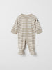 Organic Cotton Beige Baby Sleepsuit from the Polarn O. Pyret baby collection. Made using 100% GOTS Organic Cotton