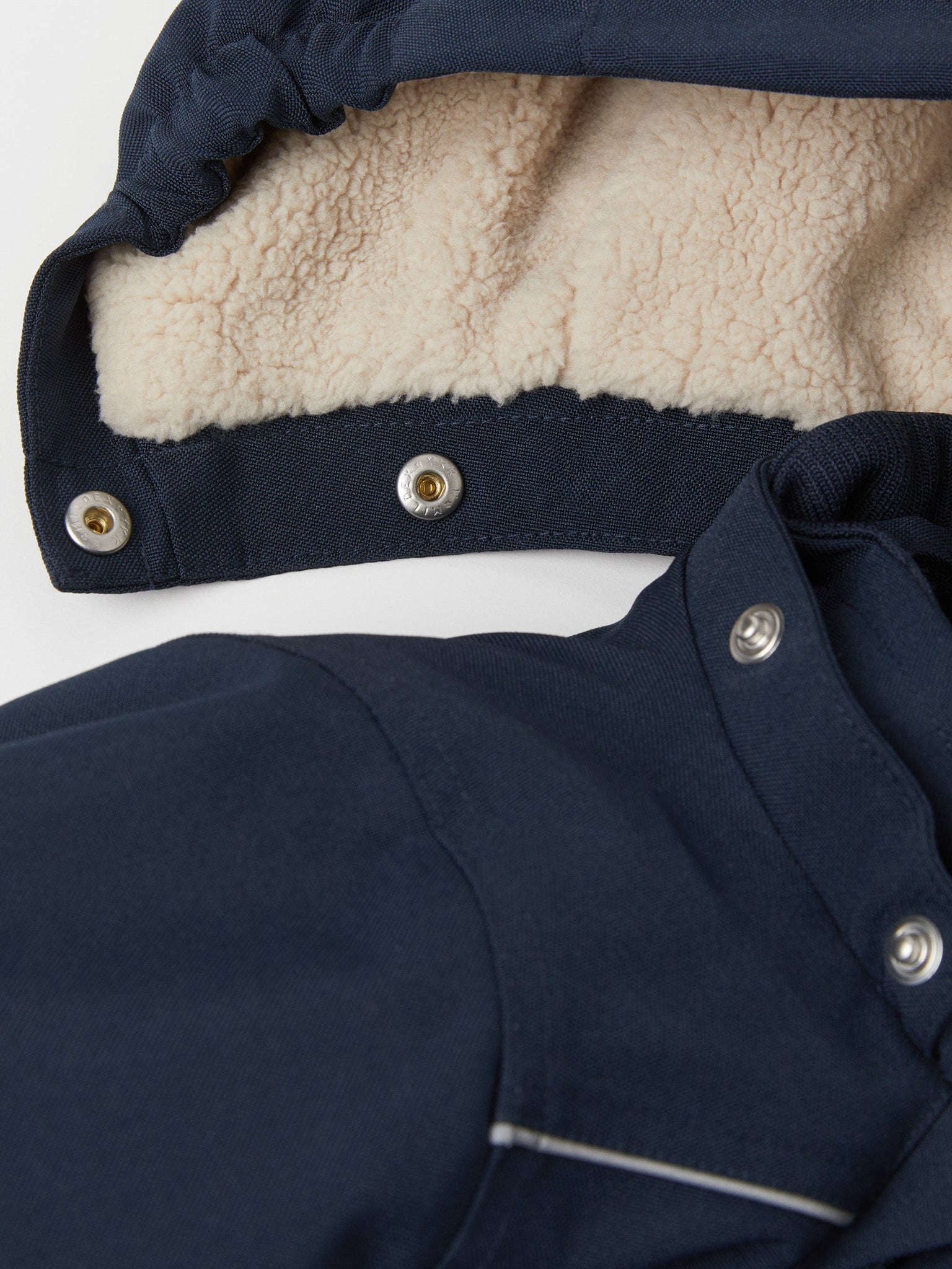 Navy Padded Baby Pramsuit from the Polarn O. Pyret outerwear collection. Ethically produced kids outerwear.