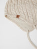 Wool Kids Beige Bobble Hat from the Polarn O. Pyret outerwear collection. Ethically produced kids outerwear.