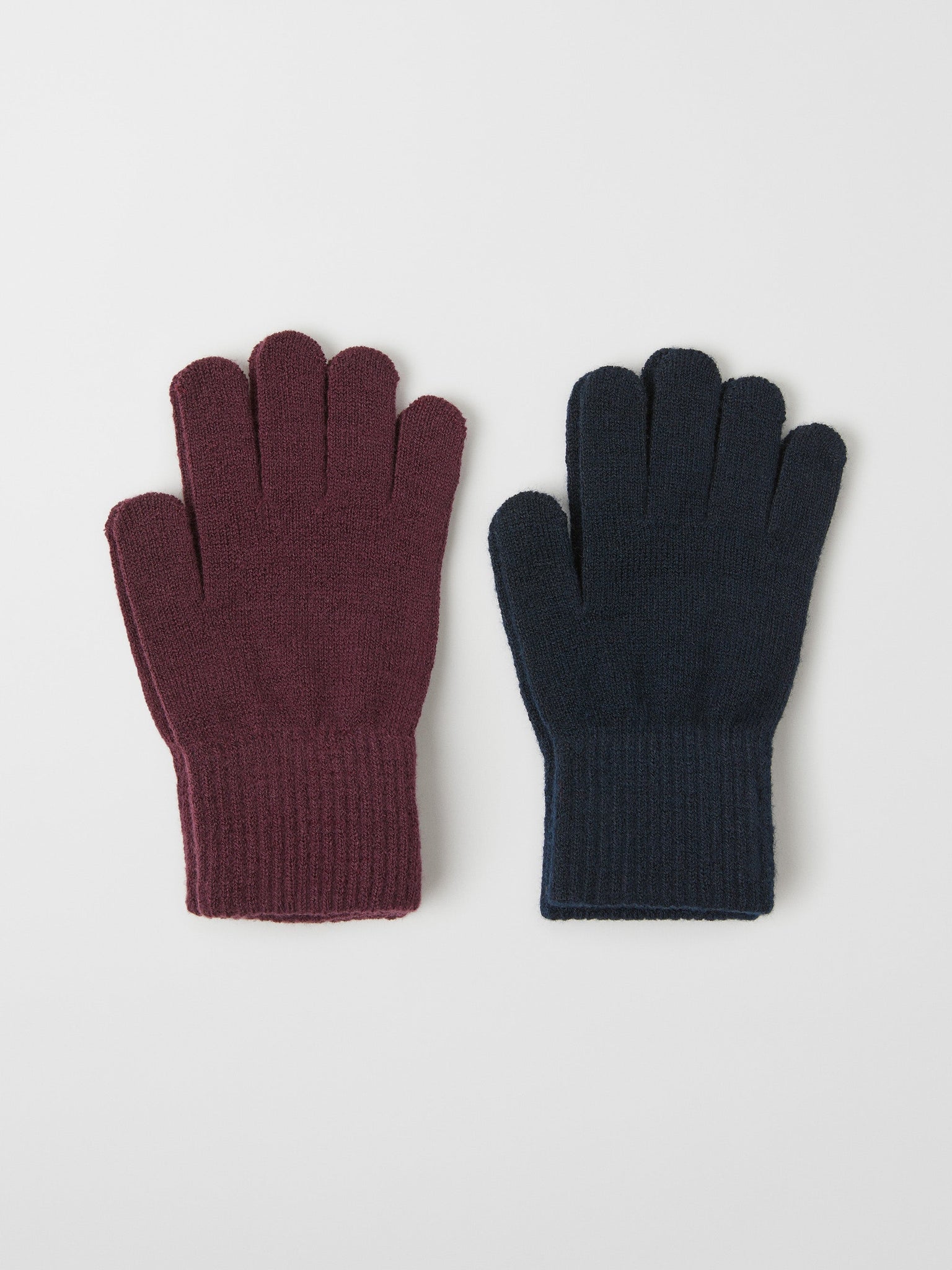Burgundy Kids Magic Gloves Multipack from the Polarn O. Pyret outerwear collection. Ethically produced kids outerwear.