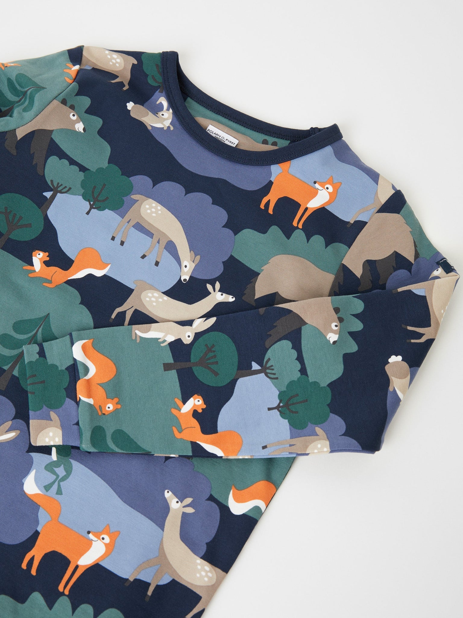 Cotton Woodland Print Navy Kids Top from the Polarn O. Pyret kids collection. Clothes made using sustainably sourced materials.