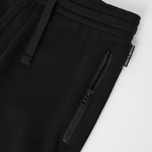 Organic Cotton Kids Black Joggers from the Polarn O. Pyret kids collection. Made using 100% GOTS Organic Cotton