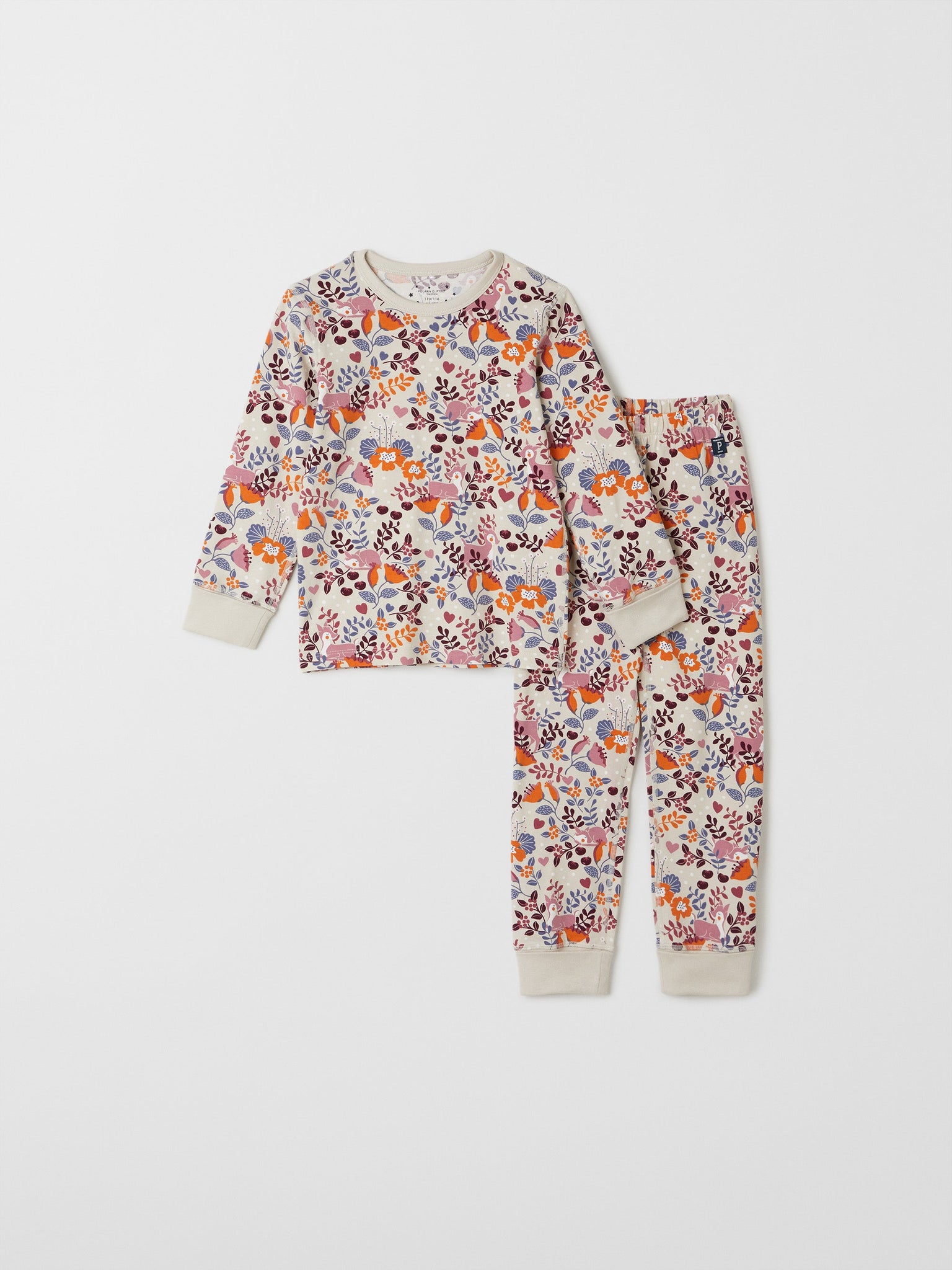 Floral Print Kids Beige Pyjamas from the Polarn O. Pyret kids collection. Nordic kids clothes made from sustainable sources.