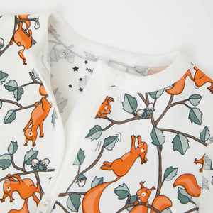 Squirrel Print White Baby Sleepsuit from the Polarn O. Pyret baby collection. The best ethical baby clothes