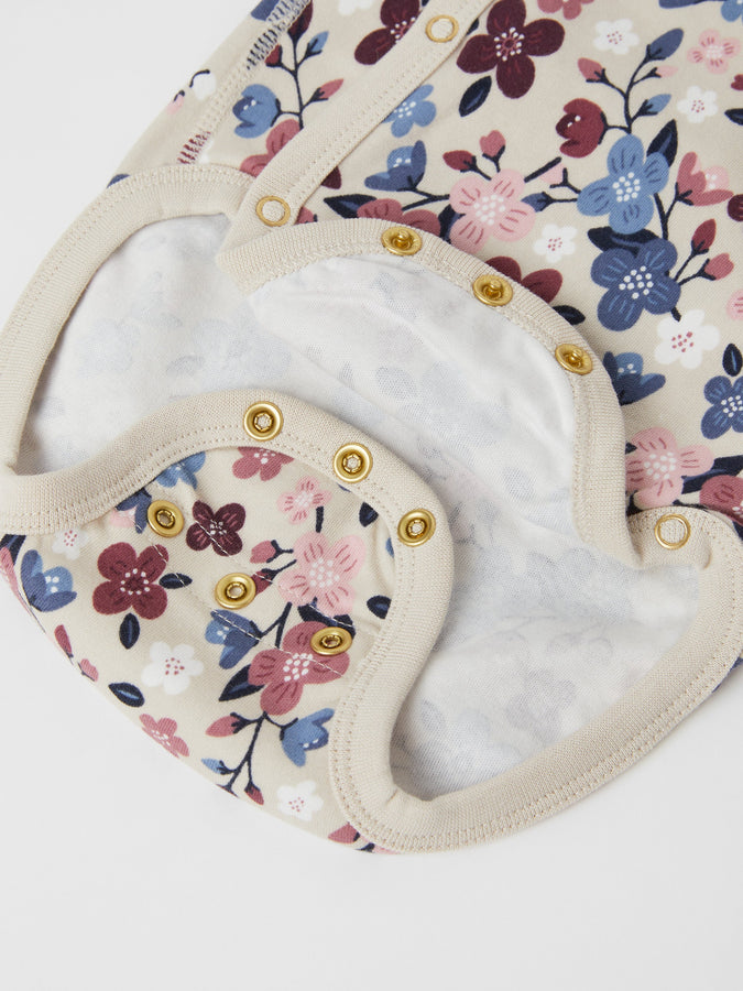 Organic Floral Wrapround Babygrow from the Polarn O. Pyret baby collection. Made using 100% GOTS Organic Cotton