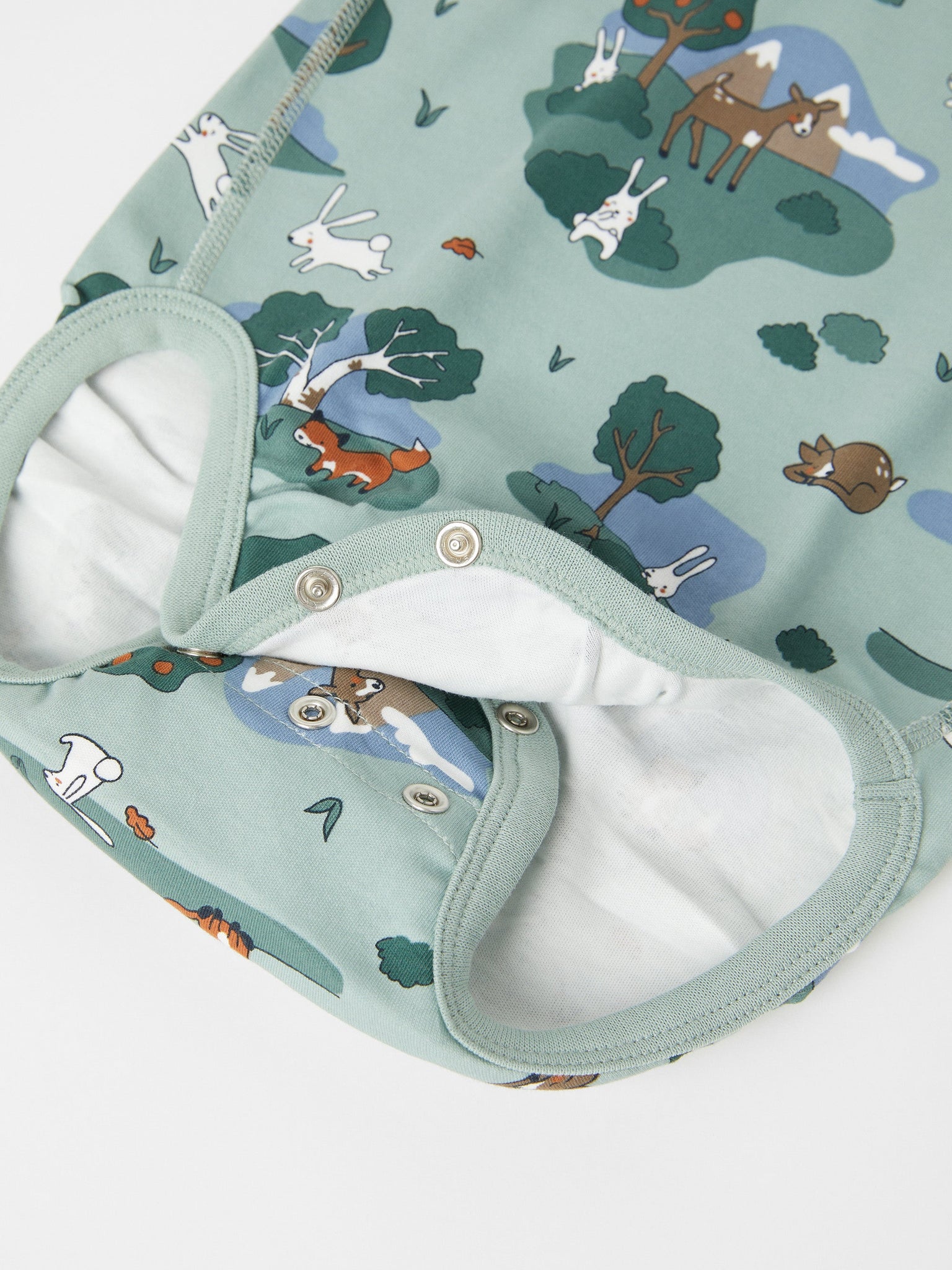 Green Organic Cotton Babygrow from the Polarn O. Pyret baby collection. Nordic baby clothes made from sustainable sources.