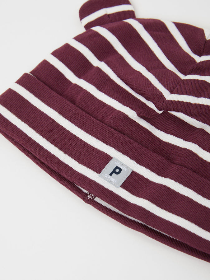 Organic Cotton Burgundy Baby Beanie from the Polarn O. Pyret baby collection. Nordic baby clothes made from sustainable sources.