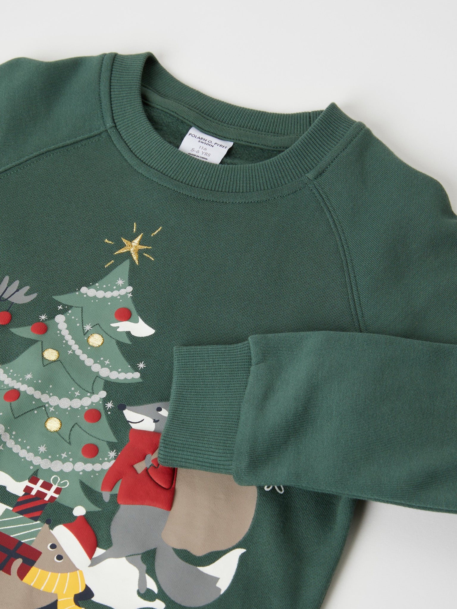 Cotton Kids Christmas Sweatshirt from the Polarn O. Pyret kidswear collection. The best ethical kids clothes