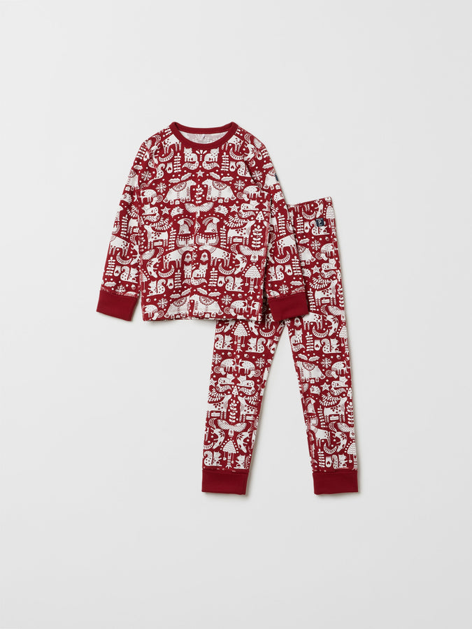 Red Organic Kids Christmas Pyjamas from the Polarn O. Pyret kidswear collection. Clothes made using sustainably sourced materials.