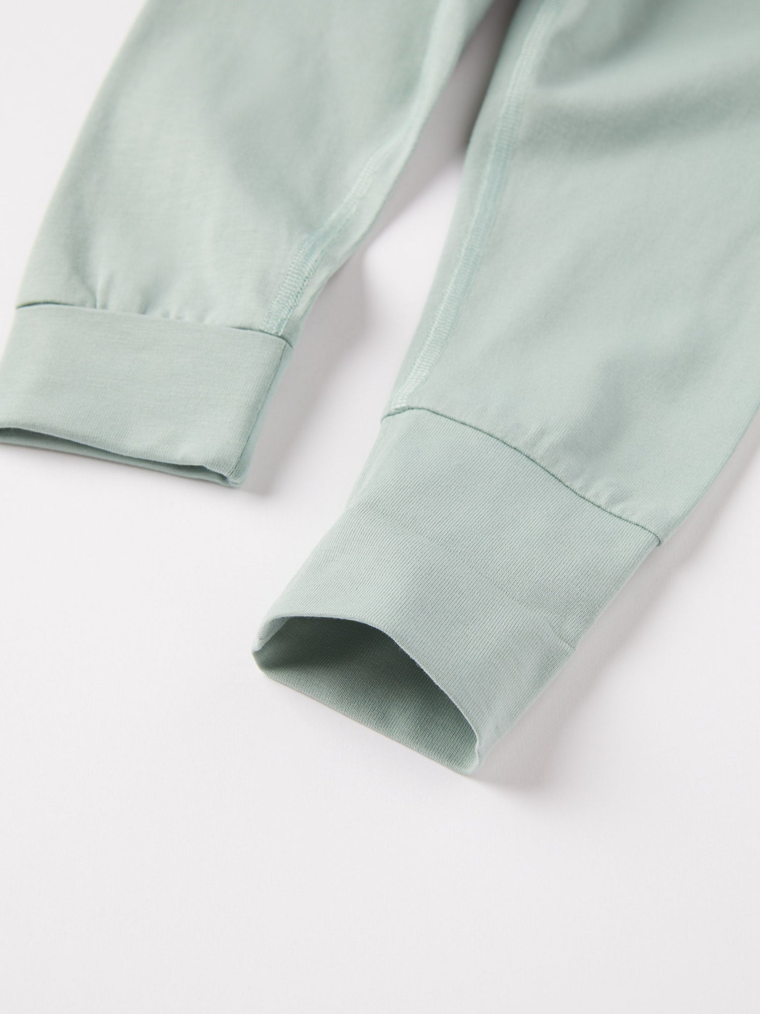 Green Organic Cotton Baby Leggings from the Polarn O. Pyret baby collection. Nordic kids clothes made from sustainable sources.