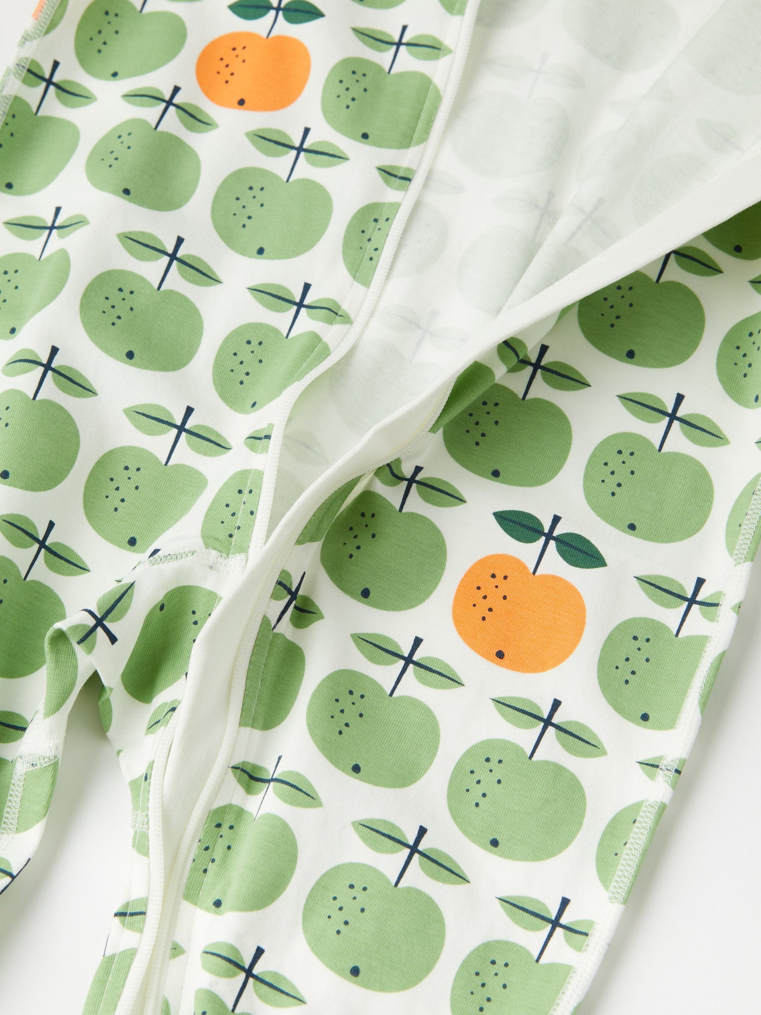 Apple Print Baby Sleepsuit from the Polarn O. Pyret baby collection. The best ethical kids clothes