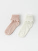 Two Pack Frilled Baby Socks from the Polarn O. Pyret kidswear collection. Clothes made using sustainably sourced materials.