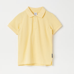 Yellow Kids Polo Shirt from the Polarn O. Pyret kidswear collection. Clothes made using sustainably sourced materials.