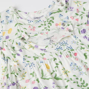 Ditsy FloralOrganic Cotton Baby Dress from the Polarn O. Pyret baby collection. Clothes made using sustainably sourced materials.