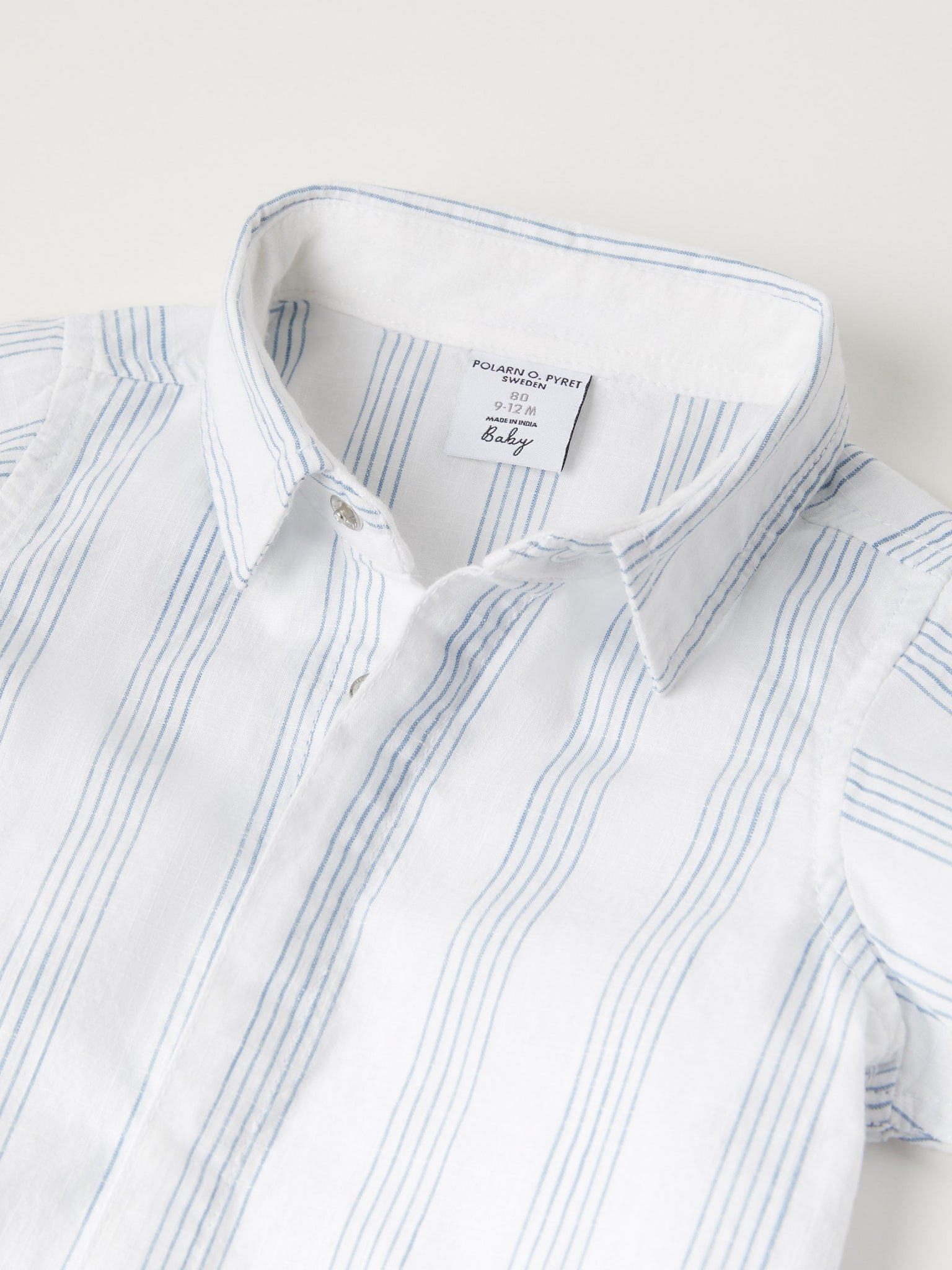 Organic Cotton Striped Baby Shirt from the Polarn O. Pyret baby collection. Nordic kids clothes made from sustainable sources.