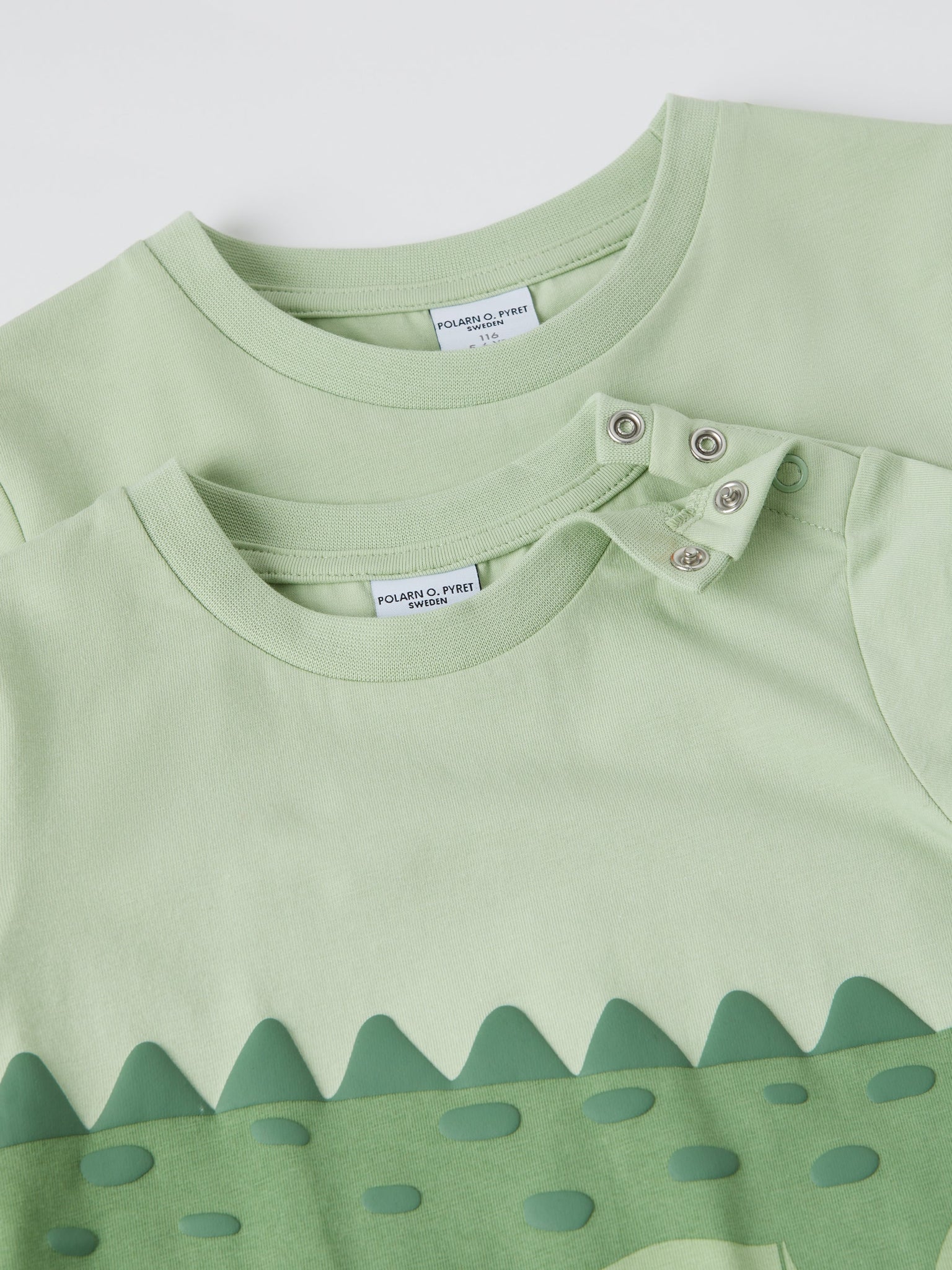 Crocodile Print Kids T-Shirt from the Polarn O. Pyret kidswear collection. Nordic kids clothes made from sustainable sources.