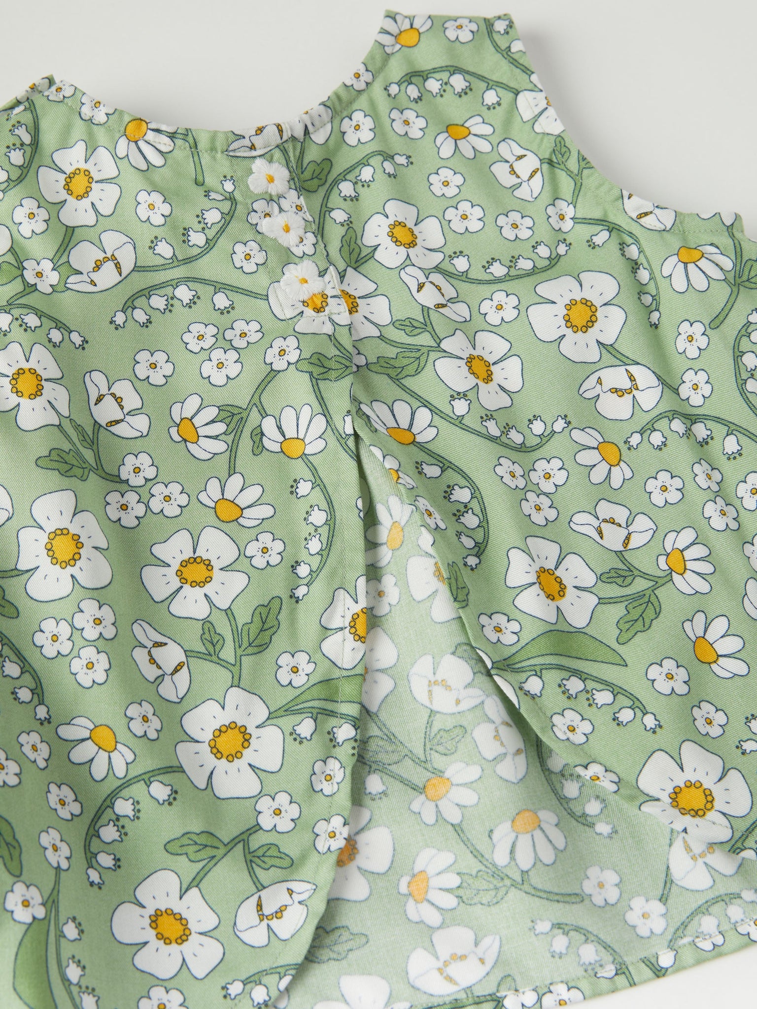 Pretty Green Daisy Print Top & Shorts Set from the Polarn O. Pyret baby collection. The best ethical kids clothes