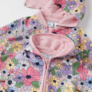 Pink Floral Print Baby All-in-one from the Polarn O. Pyret baby collection. Clothes made using sustainably sourced materials.