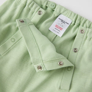 Smart Green Cotton Baby Shorts from the Polarn O. Pyret baby collection. Nordic kids clothes made from sustainable sources.