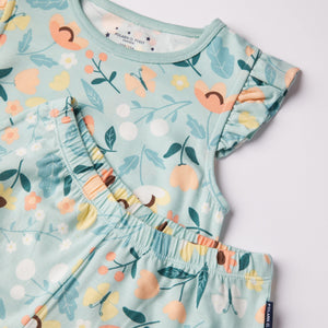 Floral Print Kids Short Pyjamas from the Polarn O. Pyret kidswear collection. Clothes made using sustainably sourced materials.