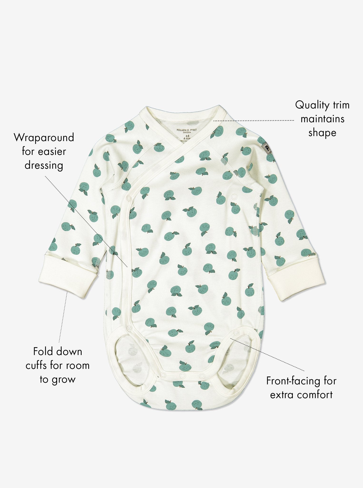 GOTS organic cotton long sleeve newborn babygrow in a unisex apple print with text labels shown on the sides