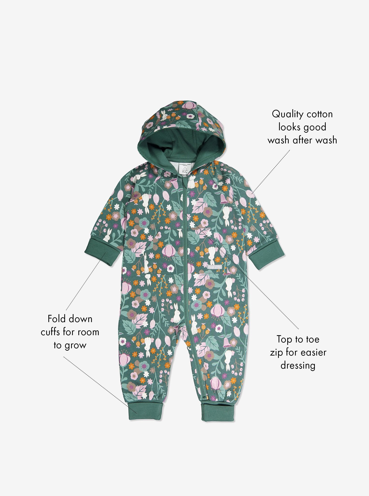GOTS organic cotton baby all-in-one in a woodland print with text labels shown on the sides