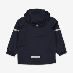 Back view of kids waterproof jacket in navy, with detachable hood, adjustable cuffs and reflectors, made of shell fabric.