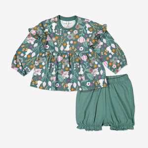 Matching set for baby girl in organic cotton comprising long sleeve top with woodland floral and bunny print. Shown with matching frilled bloomers in green.