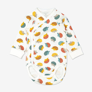 Hedghog print babygrow for newborn babies in a wraparound style, made from 100% organic cotton fabric