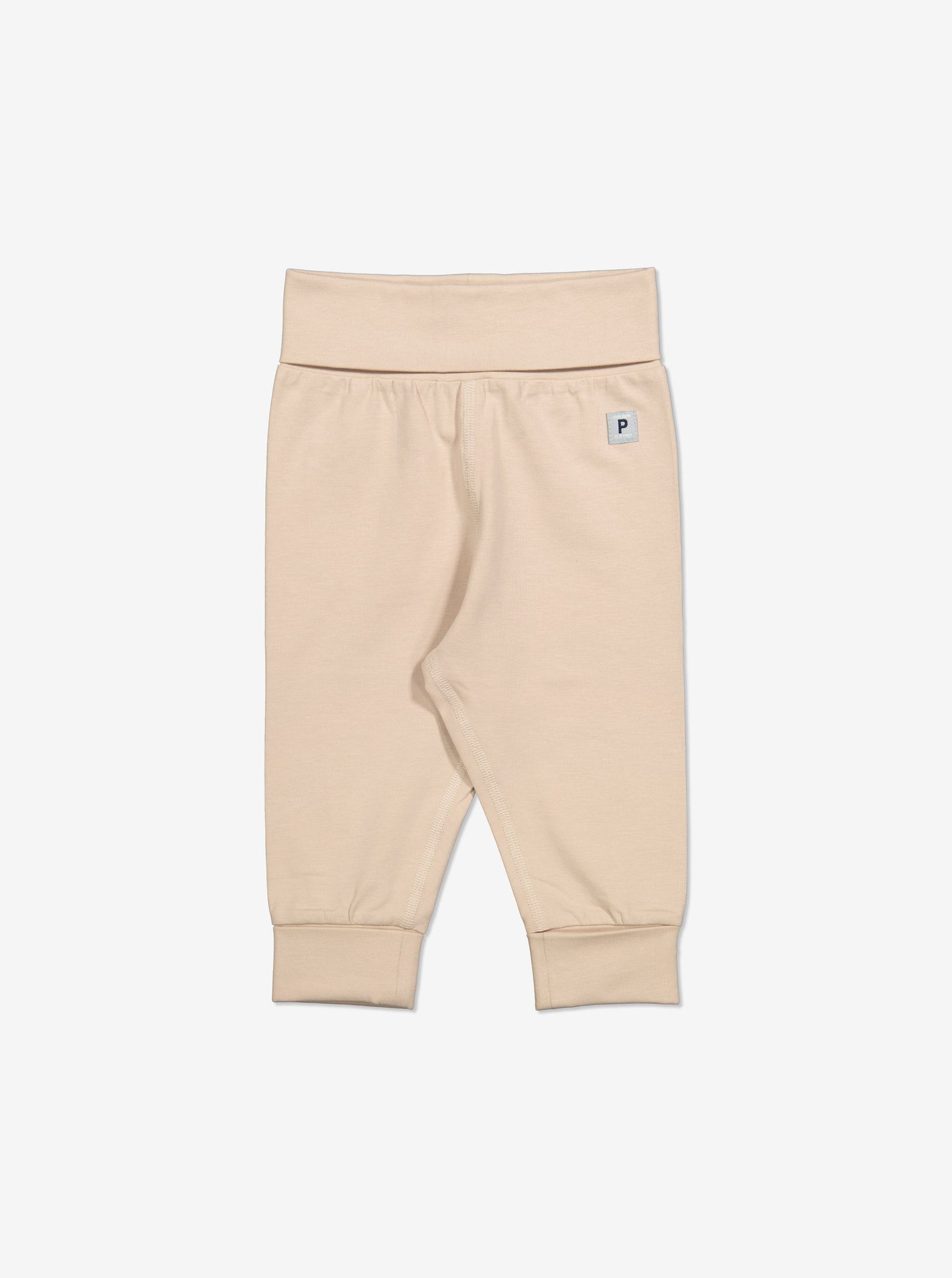  Organic Beige Baby Leggings from Polarn O. Pyret Kidswear. Made from ethically sourced materials.