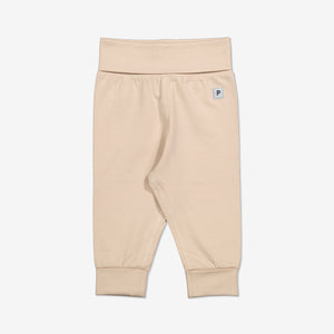  Organic Beige Baby Leggings from Polarn O. Pyret Kidswear. Made from ethically sourced materials.