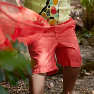Red Organic Cotton Kids Chino Shorts from Polarn O. Pyret Kidswear. Made from 100% GOTS Organic Cotton.