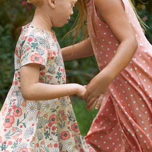 Peach Polka Dot Girls Dress from Polarn O. Pyret Kidswear. Ethically made and sustainably sourced materials.