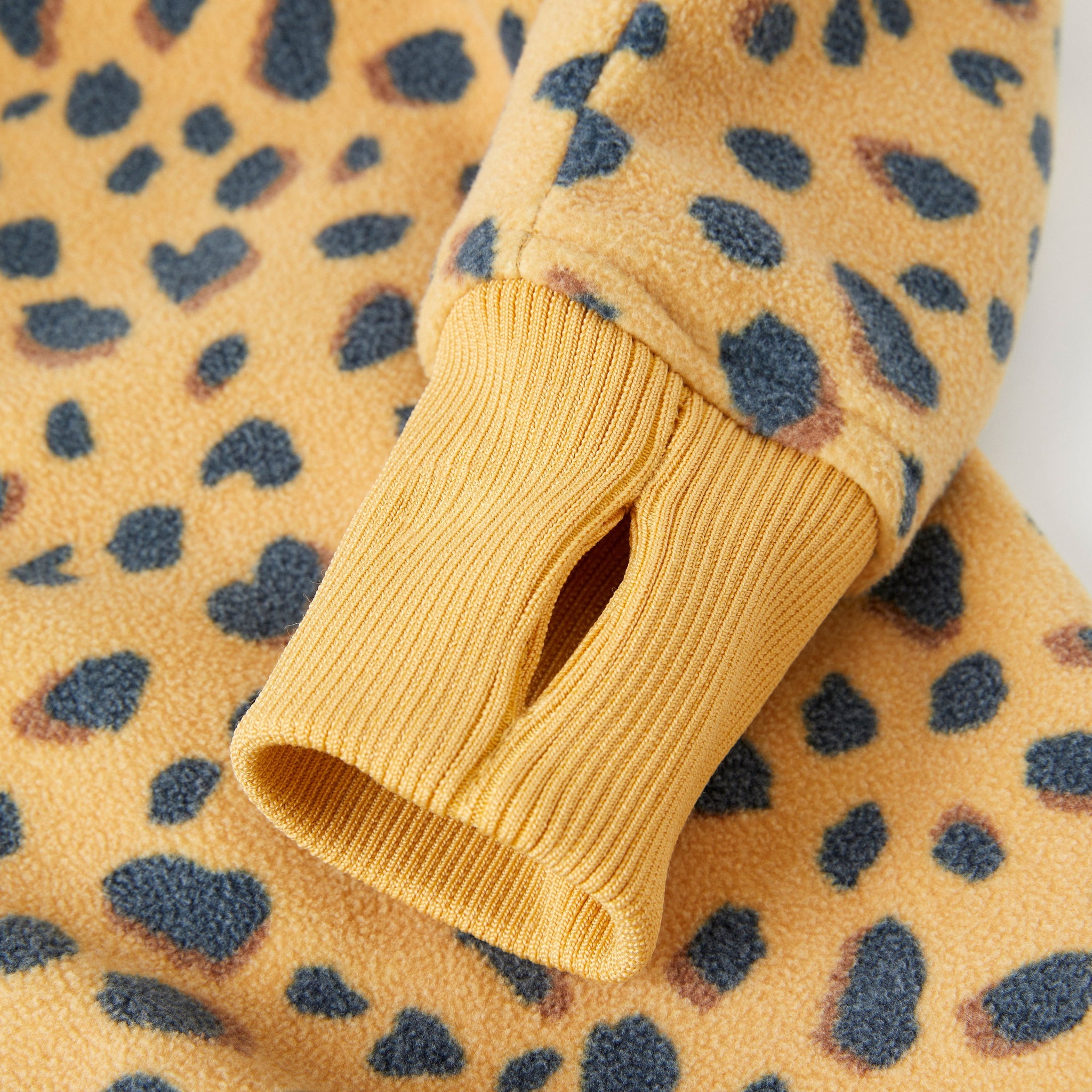 Leopard Print Kids Fleece Jacket from the Polarn O. Pyret kidswear collection. Ethically produced outerwear.