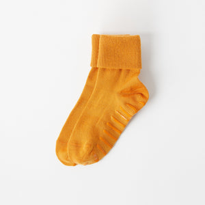 Yellow Merino Wool Baby Socks from the Polarn O. Pyret kidswear collection. Ethically produced kids outerwear.