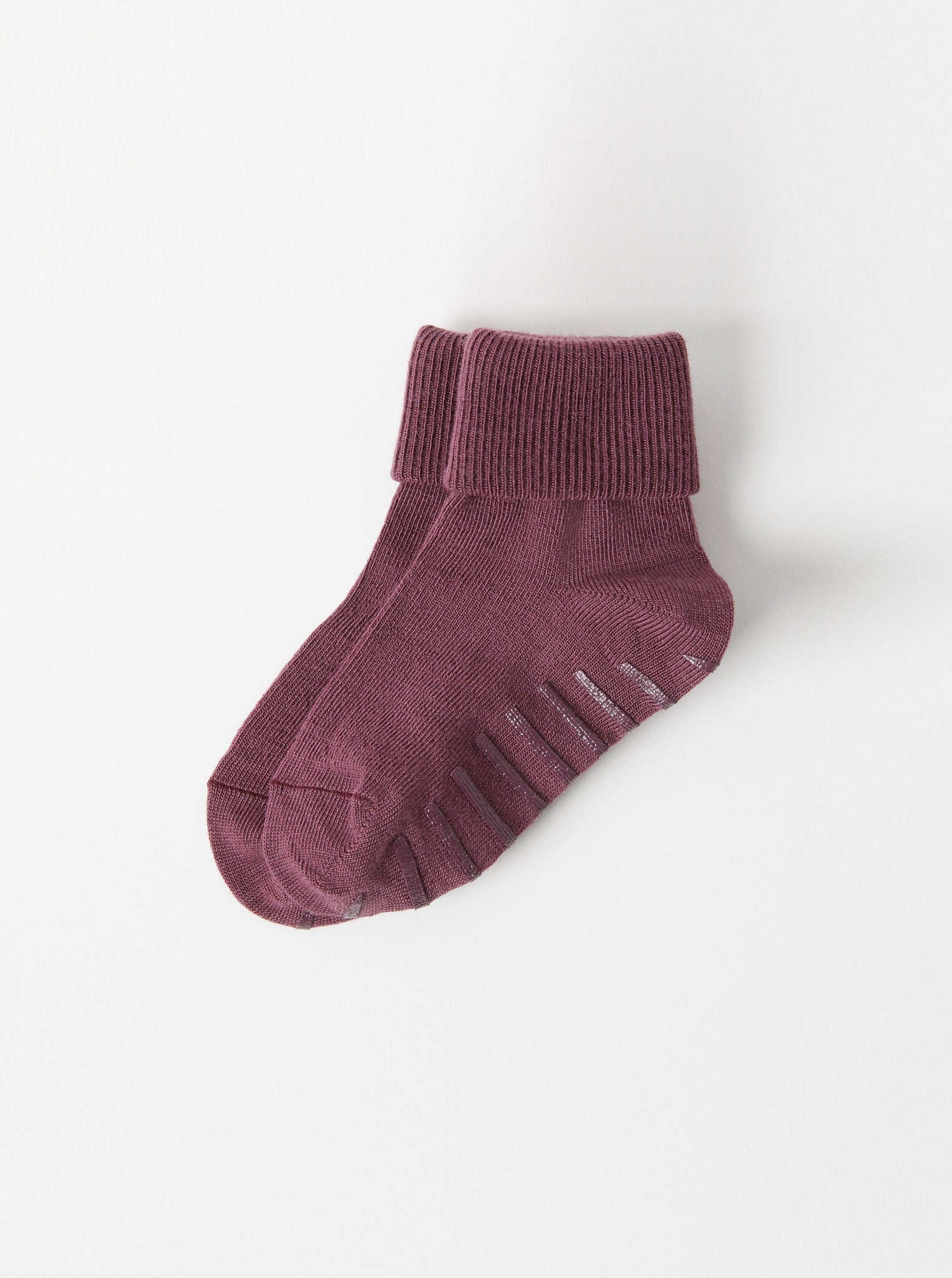 Burgundy Merino Wool Baby Socks from the Polarn O. Pyret kidswear collection. Sustainably produced kids outerwear.