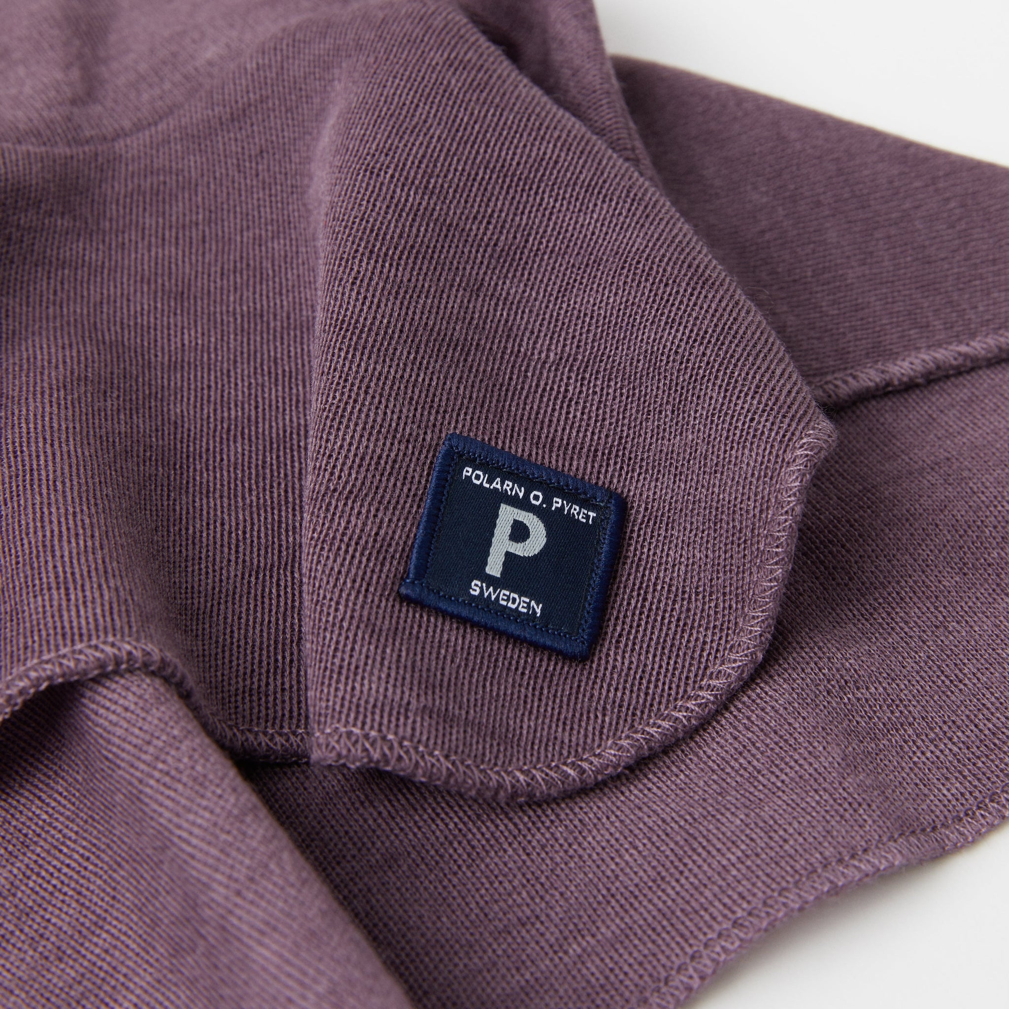 Merino Wool Purple Kids Snood from the Polarn O. Pyret kidswear collection. Ethically produced outerwear.